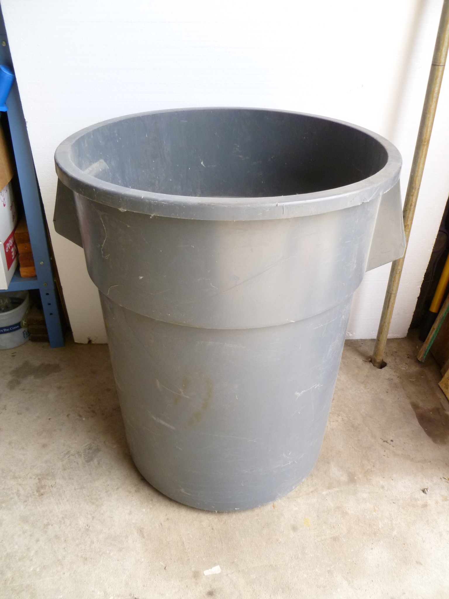 lot 7 image: 55 Gallon Husky Garbage Container