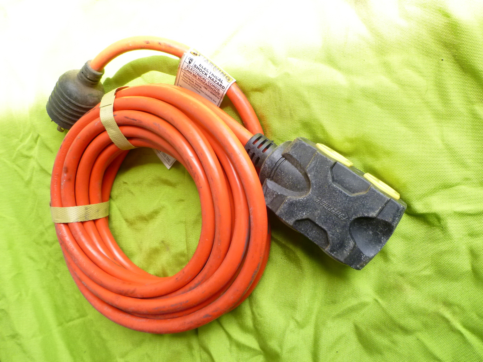 lot 20 image: Coleman Powermate 25-Foot 20 AMP Generator Cord