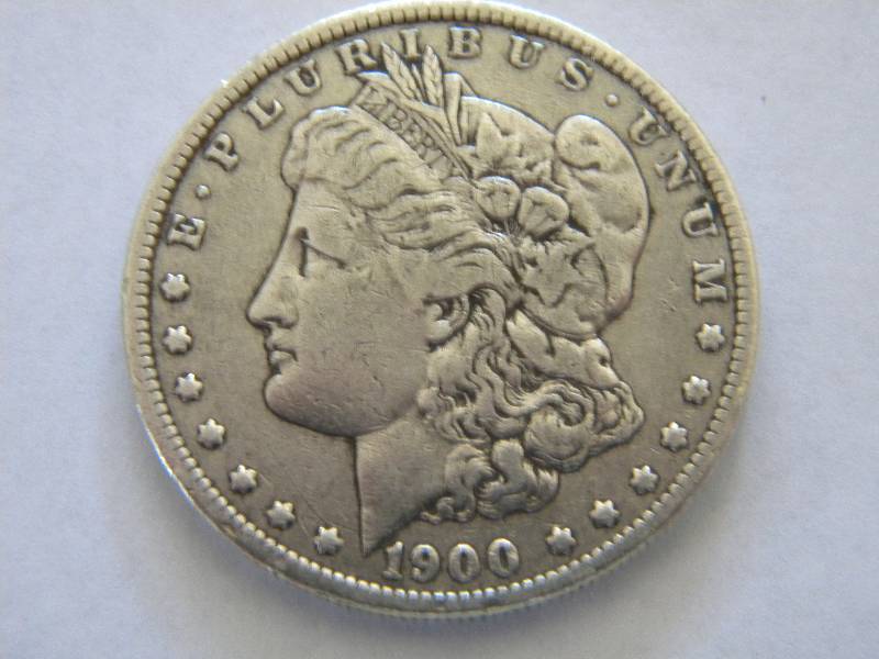 lot 1 image: 1900 O Morgan Silver Dollar