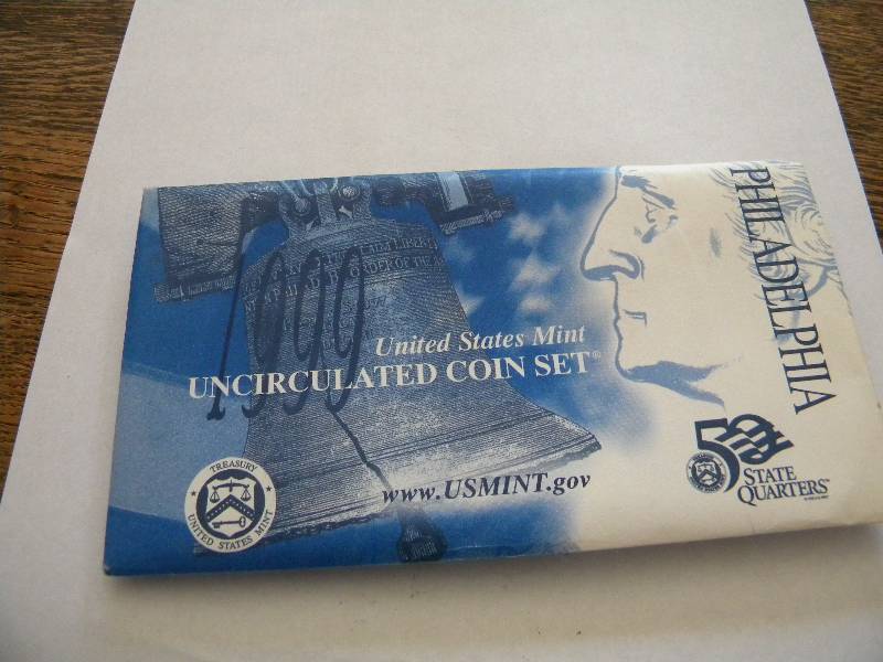 lot 27 image: 1999 Uncirculated Coin Set & 3 States Quarter Sets