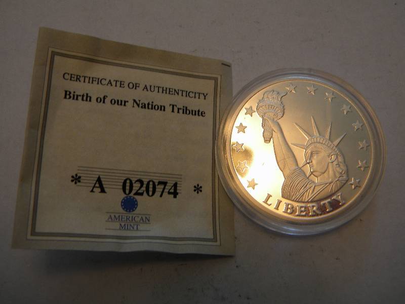 lot 35 image: 2009 Statue of Liberty Coin by the American Mint
