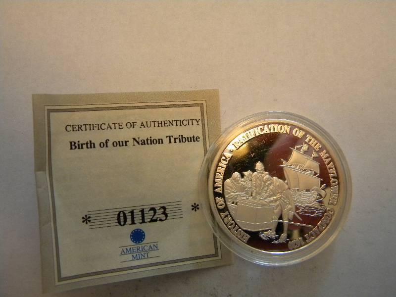 lot 36 image: 2009 Mayflower Compact Coin by the American Mint