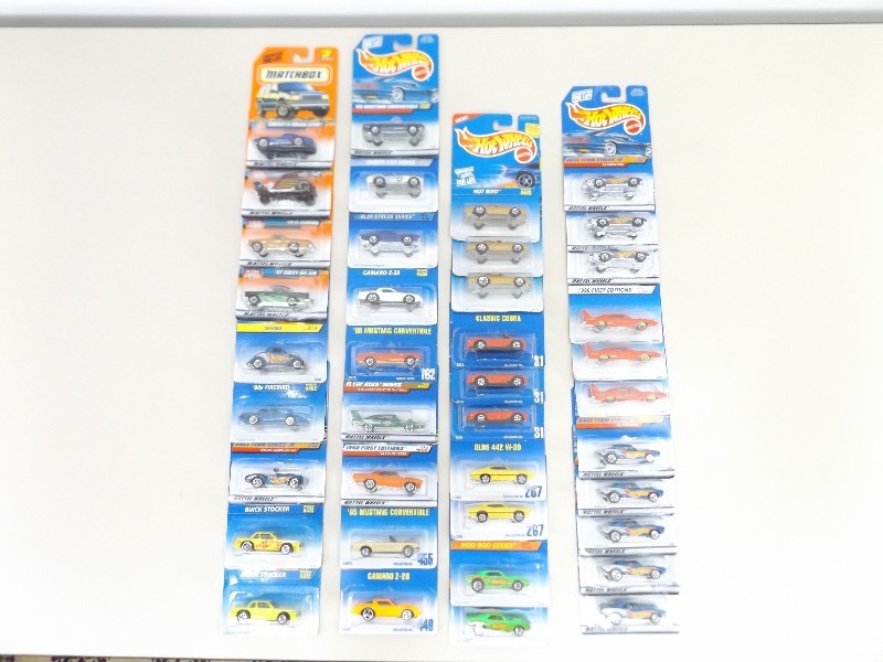 lot 17 image: 39 New in Package Hot Wheels, and Matchbox American Muscle Cars