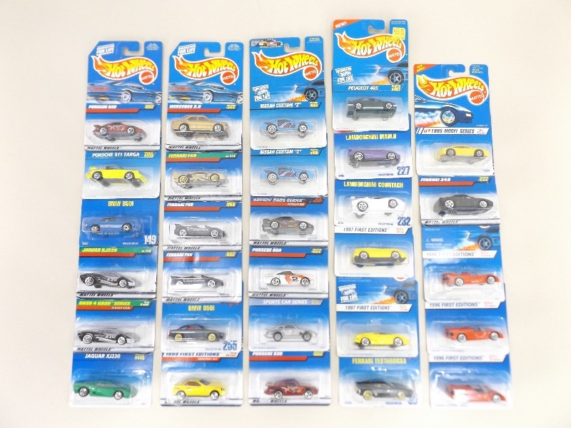 lot 34 image: 29 New in Package Hot Wheels Sports Cars