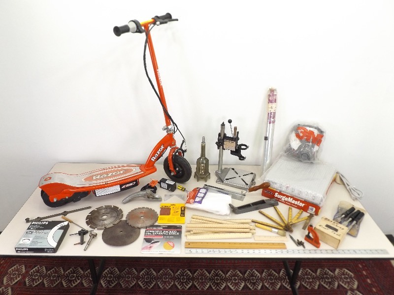 lot 49 image: Electric Razor Scooter with Charger, and Miscellaneous Tools