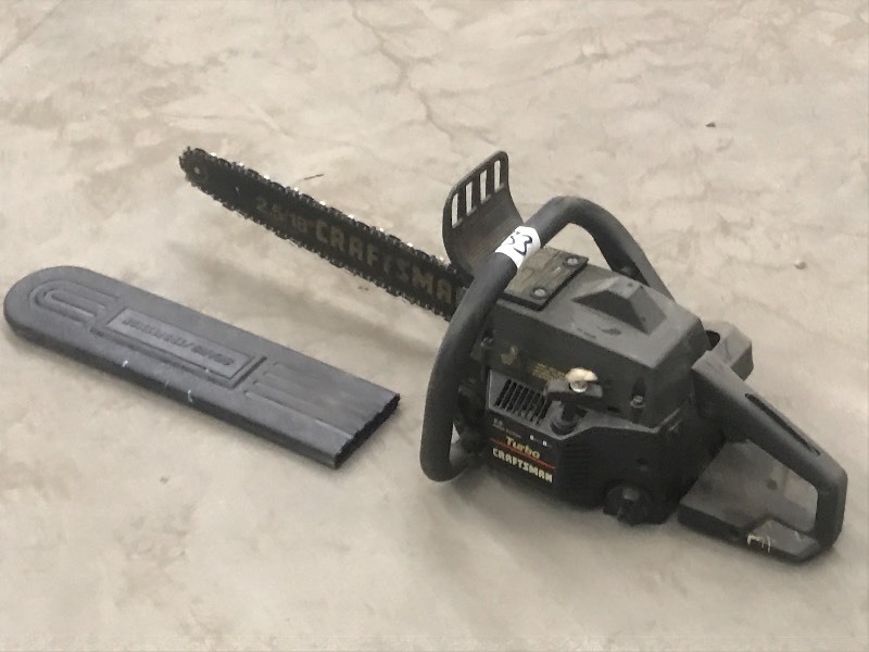 lot 33 image: Craftsman 2.518 Chainsaw, Has Com...