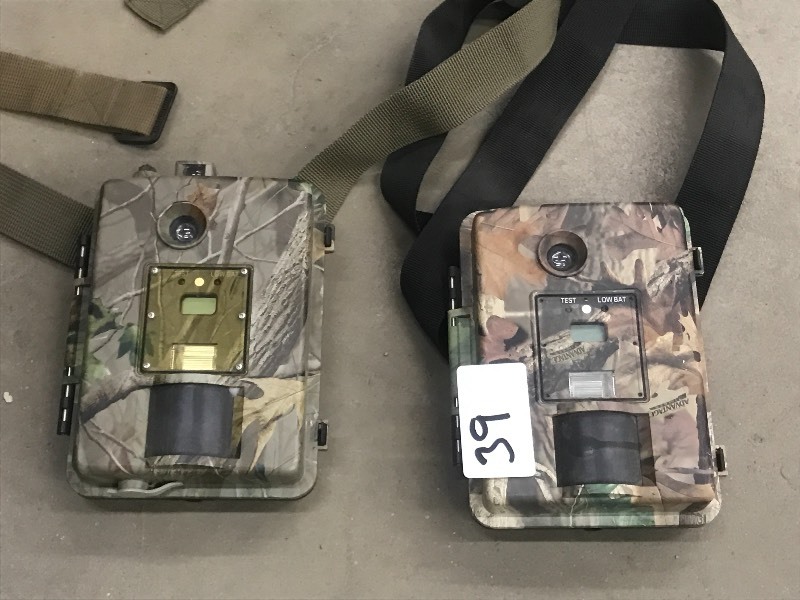 lot 39 image: (2) Camo 35mm Portable Game Cameras...