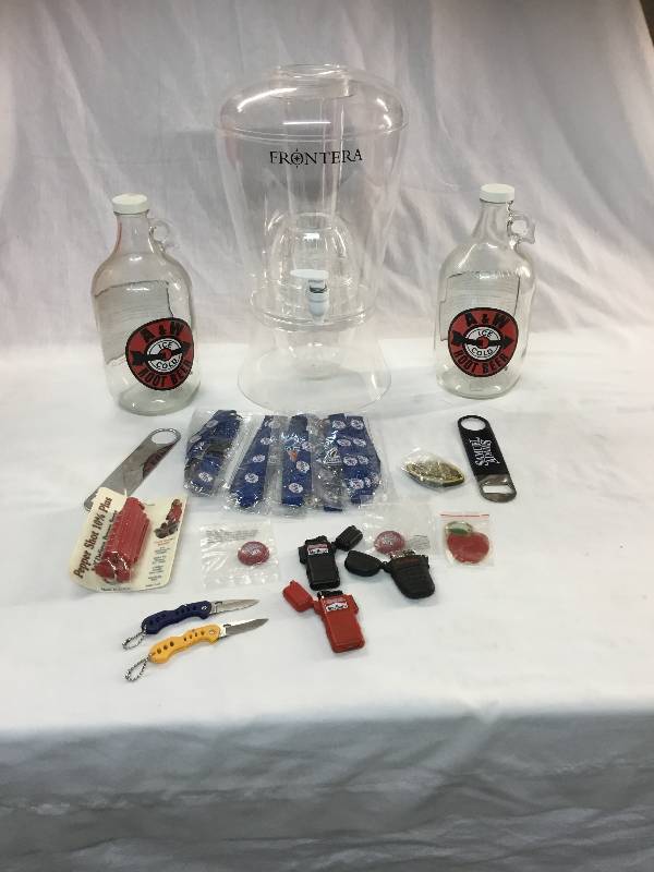 lot 9 image: WaterLemonade Dispenser, Two A&W Bottles, Two Bottle Openers, Lighters, Lanyers