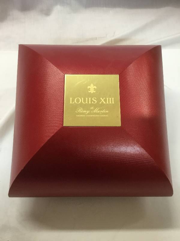 lot 46 image: Louis XIII Red case and Grande Champagne bottle