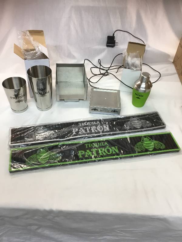 lot 47 image: Patron Lot - New Two Shakers, New Two Bar Mats, New Napkin Caddy, Bottle Light Up Stand