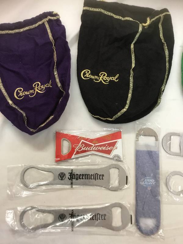 lot 49 image: Bottle Openers- Budweiser, Goose Island, & Crown Royal Bags - Green, Black, and Purple