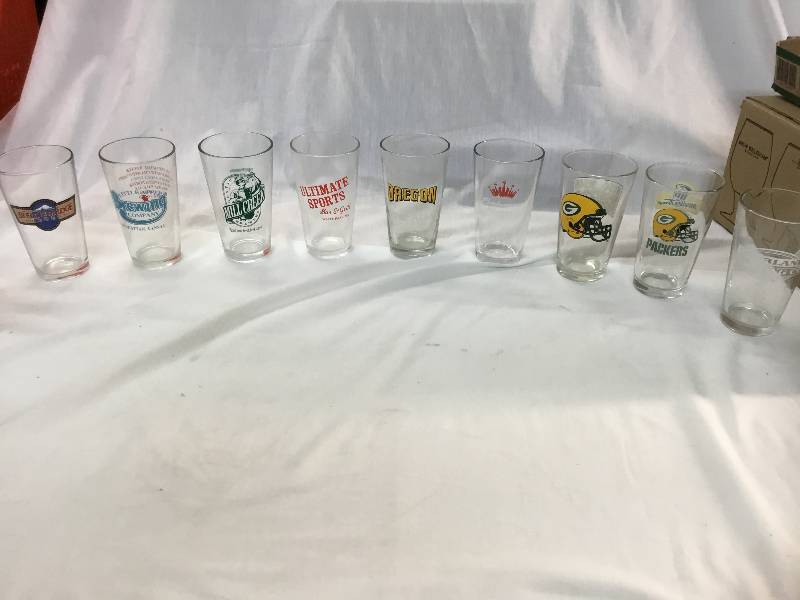 lot 57 image: 9 Different Pint Glasses