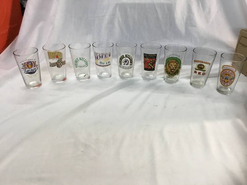 lot 58 image: 9 Different Pint Glasses