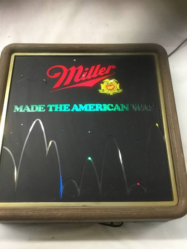 lot 16 image: Antique Miller - Light Up Sign - Colorful and back moves