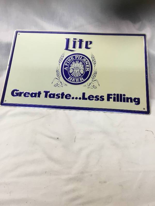 lot 108 image: Miller Lite - Great Taste... Less Filing - Tin Sign