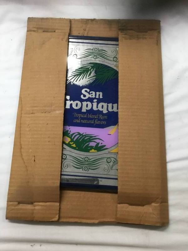 lot 111 image: Antique San Tropique Tropical island Rum Mirror