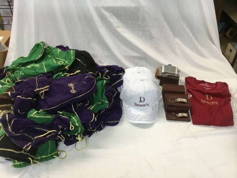 lot 156 image: 90 Crown Royal Bags - Various Size and Colors, Women Med Shirt, 2 Flasks, 8 Hats and 14 Key Chains