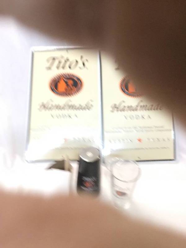 lot 158 image: Two Titos Handmade Vodka Tins, a Shaker with glass