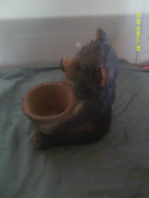 lot 35 image: BEAR HOLDING POT