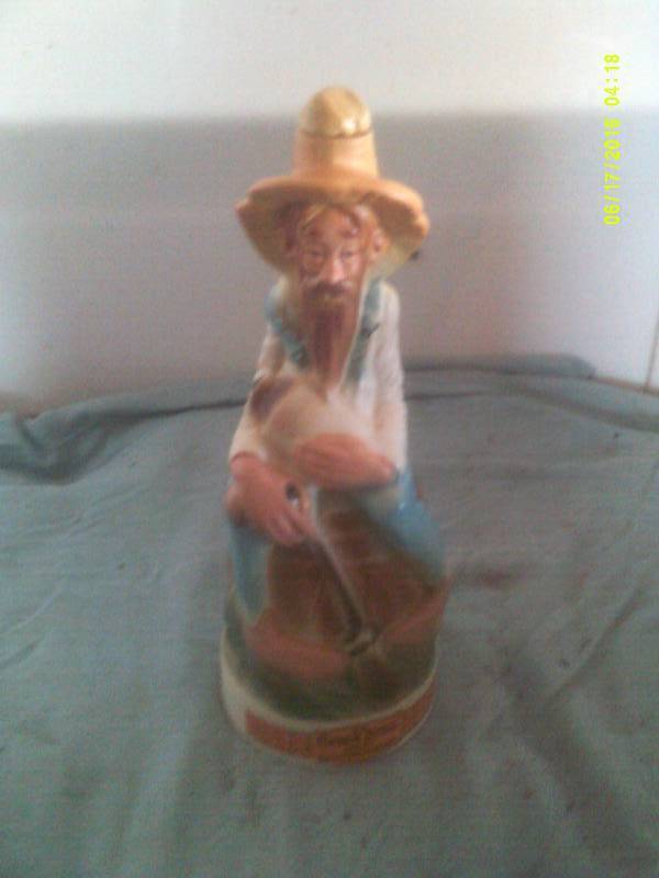 lot 88 image: COLLECTIBLE CABIN STILL WHISKEY DECANTER
