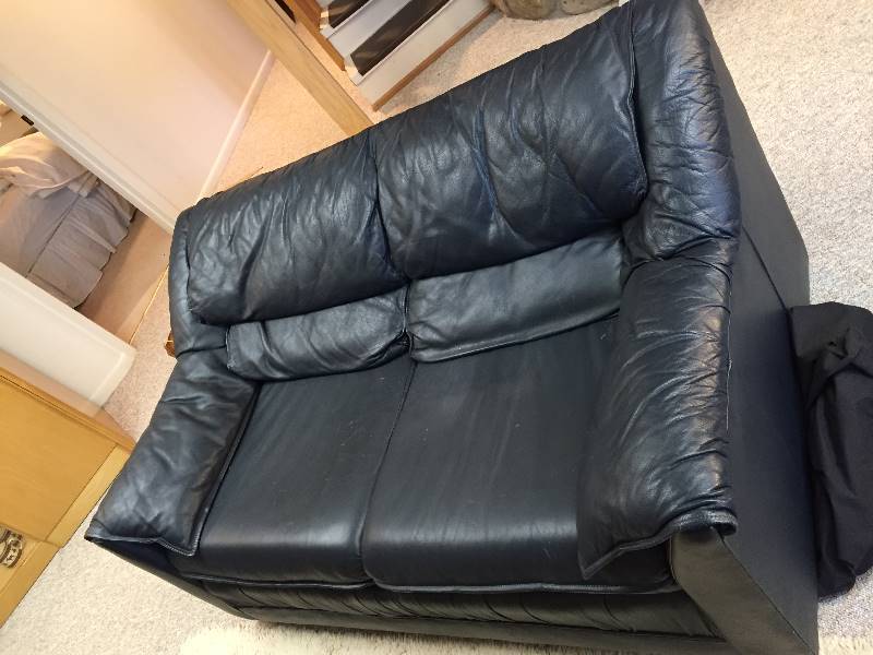 lot 225 image: Midnight Navy Blue Leather Loveseat