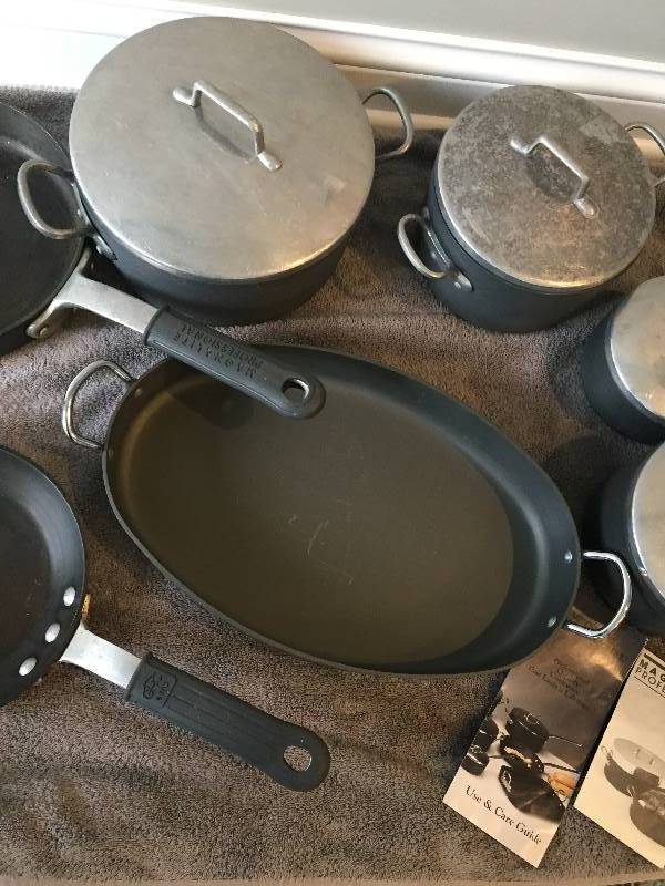 Magnalite 8 quart pot w/lid, broiling pan, steam table pan, lid and trays.  - Northern Kentucky Auction, LLC