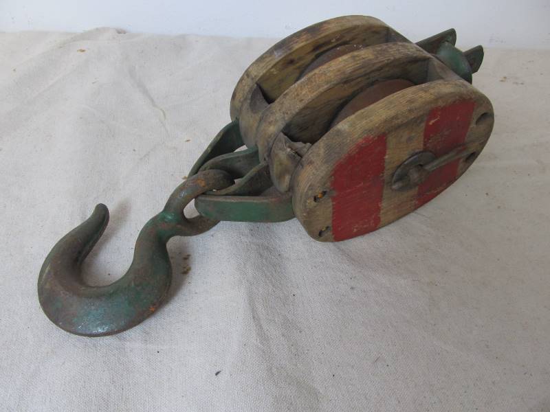 lot 56 image: Antique Painted Wood Pulley