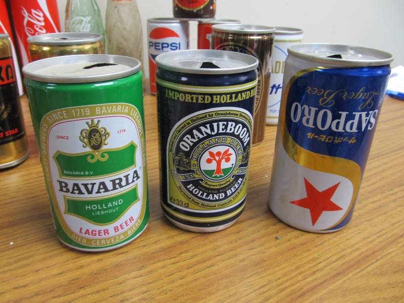 lot 22 image: Collection of Vintage Cans & Bottles - Many Foreign Coca Cola Cans