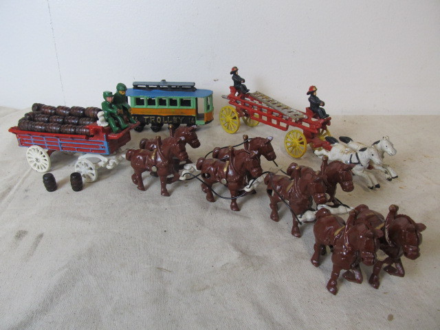 lot 92 image: Cast Iron Toy Wagon Fire Truck & Train