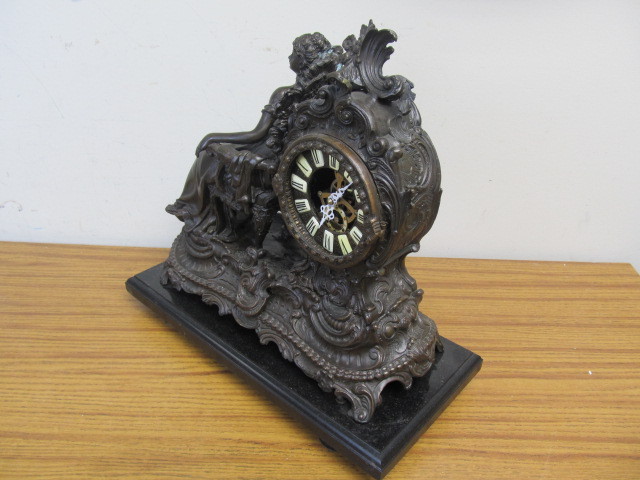 lot 101 image: Cast Metal Figural Mantel Clock
