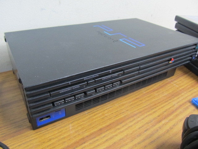 lot 177 image: Working Playstation 2 Video Game System & Games