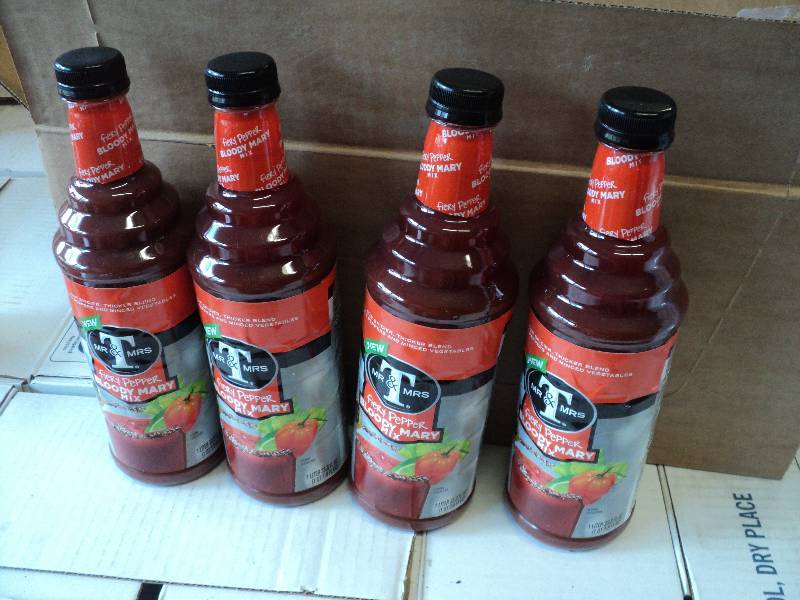 4 1 quart bottles of Mr. and Mrs. T...