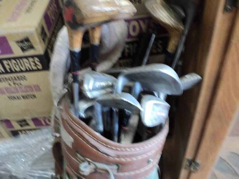 golf bag, clubs and cart...