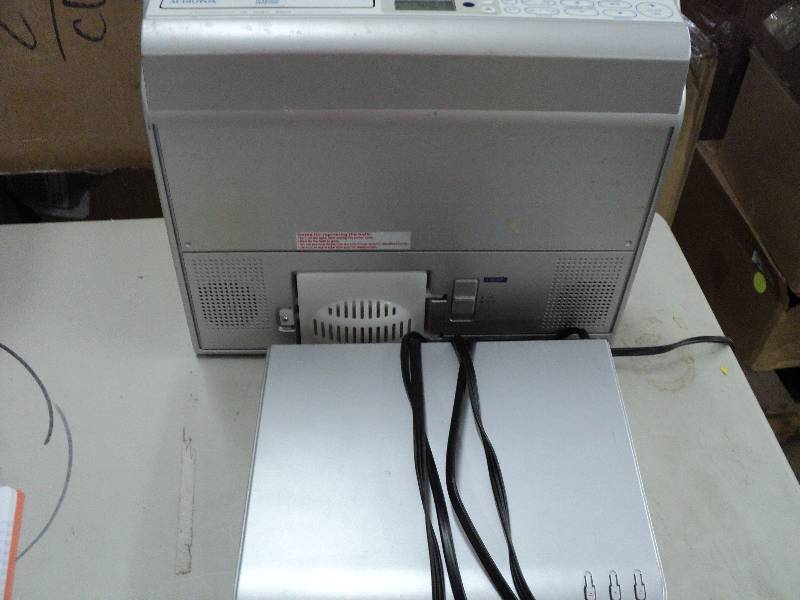 Audiovox CD clock radio and GPX DVD...