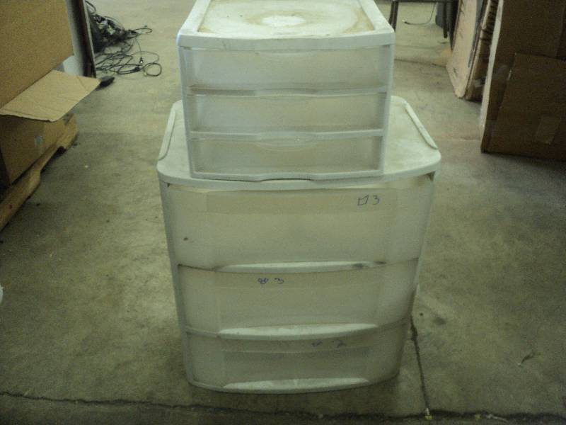 2 plastic storage containers - need...