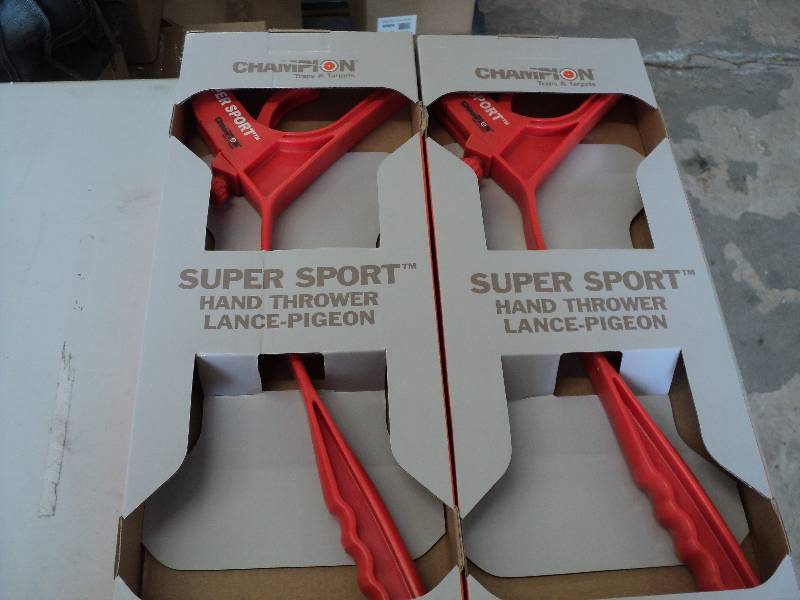 2 Super Sport Champion hand thrower...