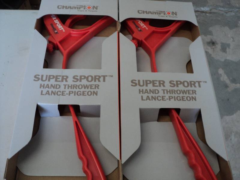 2 Super Sport Champion hand thrower...