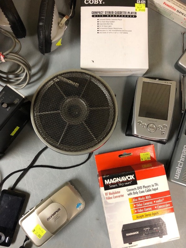lot 70 image: Plastic Box full of Vintage Electronics - Watchman - Cameras - Headphones
