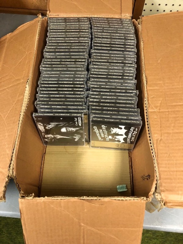 lot 71 image: Box full of Sealed Mint CDs - 60 Count The Flying Luttenbachers LIVE