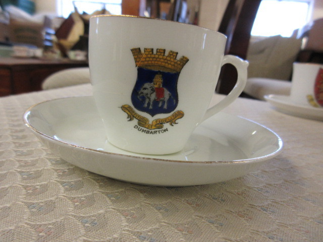 SMALL CUPS AND SAUCERS