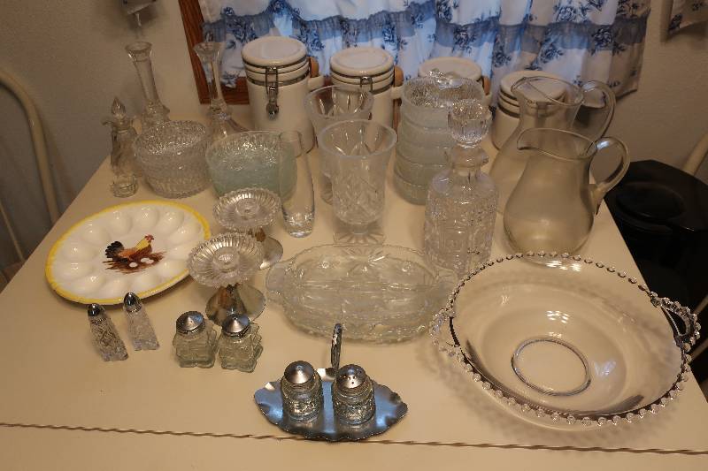 lot 39 image: Matching canisters glass serving pieces, salt and pepper shakers