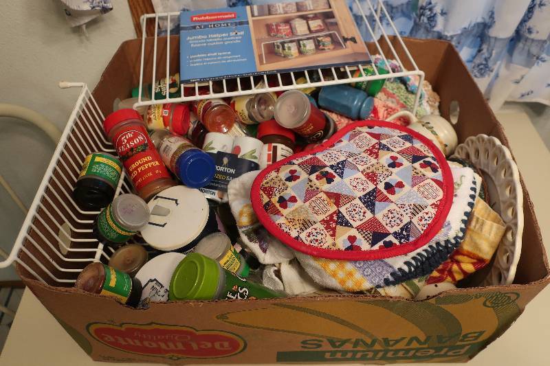 lot 54 image: Baking spices, potholders, etc