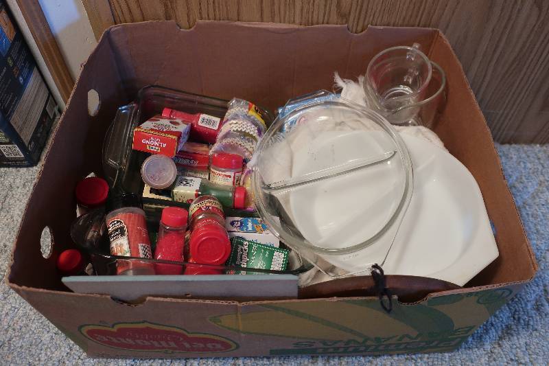 lot 135 image: Box of spices and glass bakeware
