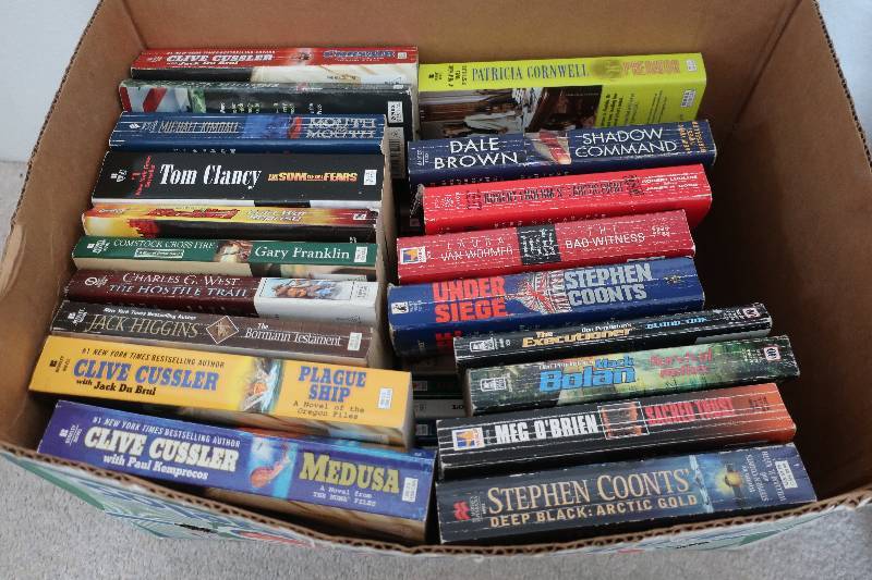 lot 150 image: Box of action and Louis LAmours