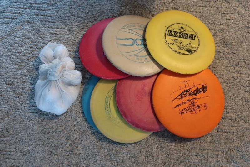 lot 198 image: Frisbee golf discs and golf balls