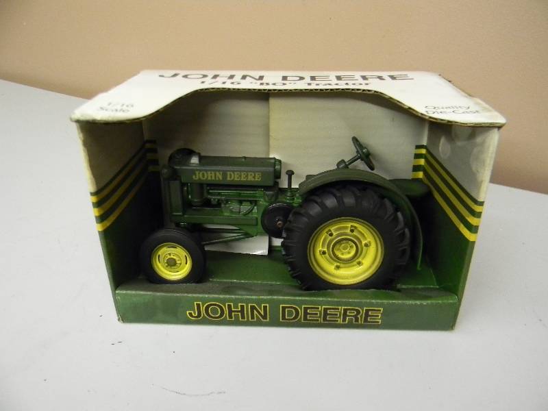 lot 36 image: SPEC CAST JOHN DEERE BO TRACTOR - 116 SCALE IN BOX - SEE PICTURES