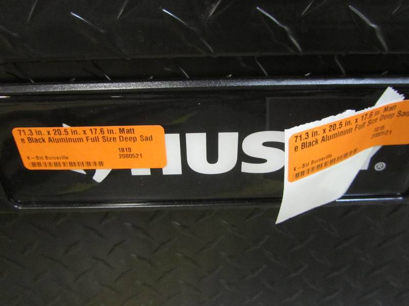 lot 25 image: Husky 71.3 in. x 20.5 in. x 17.6 in. Matte Black Aluminum Full Size Deep Saddle Truck Box