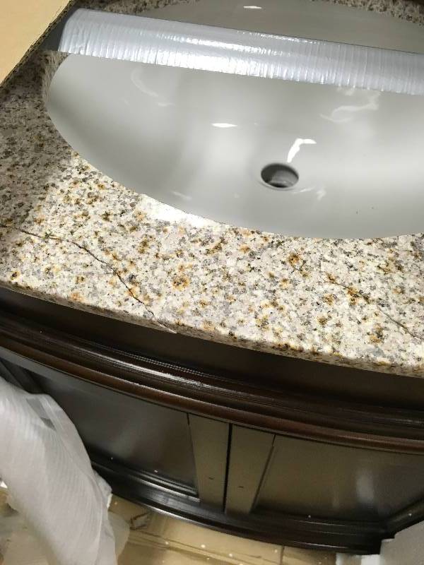 lot 11 image: 31 in. W x 35 in. H x 20 in. D Vanity in Cherry with Granite Vanity Top have damage