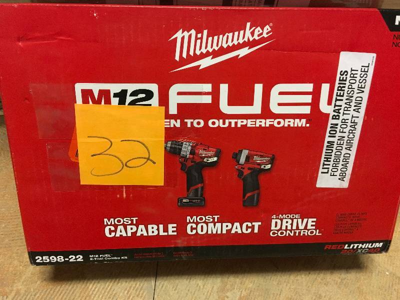 lot 32 image: Milwaukee M12 FUEL 12-Volt Li-Ion Brushless Cordless Hammer Drill and Impact Driver Combo Kit (2-Tool) with Charger and Tool Bag not used