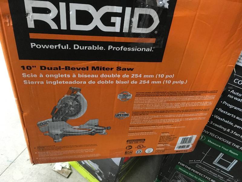 lot 85 image: Ridgid 15 Amp 10 in. Dual Bevel Miter Saw missing the dust bag in like new condition